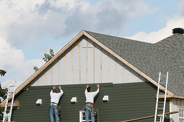 Professional Emergency Siding Repair technician working in Dundee, OH